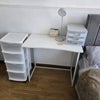 Photo 2: Desk/workspace and additional storage in the bedroom