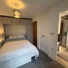 Photo 5: Bedroom 4- en-suite and balcony to rear