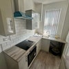 Photo 7: Kitchen but there is a washer machine 