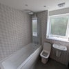 Photo 6: Shared bathroom with bath