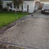 Photo 3: Front of house and driveway 