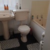Photo 9: Upstairs bathroom 