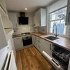 Photo 2: Kitchen with dishwasher