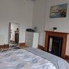 Photo 5: Duvet and cover set not included, Room at front of flat