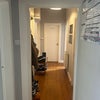 Photo 9: Hallway, room is first on the right.
