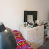 Photo 5: The bedroom. (Sofa will be moved to the living room.)