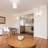 Photo 3: Cosy open-plan living space