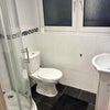 Photo 5: Shower and toilet upstairs