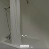 Photo 6: Bath tub with shower
