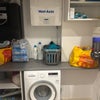 Photo 9: Utility / washjng machine cupboard 