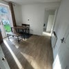 Photo 8: Flat living room with entrance to flat bedroom