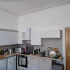 Photo 3: Kitchen area.