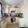 Photo 8: Gas hob, storage space, washing machine 