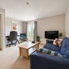 Photo 2: Spacious separate lounge and work area