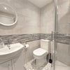 Photo 5: Room 1, shared toilet