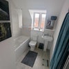 Photo 9: Shared Bathroom