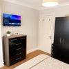 Photo 2: Wall-mounted TV Bedroom 2