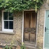 Photo 4: Front door of landlords house