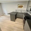 Photo 3: Open plan kitchen