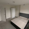 Photo 7: The spacious room with essentials, as you'll move into