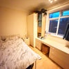 Photo 8: Single bedroom with built-in wardrobe and chest of drawers