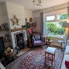 Photo 8: The shared living room.
