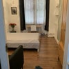 Photo 2: Bedroom with wardrobe and double bed