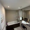 Photo 5: Shared bathroom with 1 female