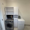 Photo 4: Cupboard for utensils microwave and fridge