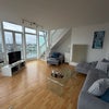 Photo 3: Lounge with large sofa and amazing views