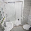 Photo 9: Off suite bathroom shared with 1 other tenant