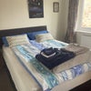Photo 2: Bedroom with king size bed and desk