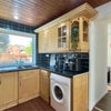 Photo 5: Kitchen (Washer + Dryer)