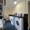 Photo 17: Single en-suite’s laundry room