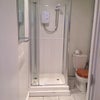 Photo 6: Small bathroom with electric shower