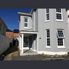Photo 3: Exterior/parking spaces