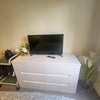 Photo 4: Chest of drawers and TV