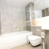 Photo 11: common bathroom