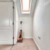 Photo 5: The doorway to the en-suite bedroom
