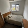 Photo 1: Doubled bed - lots of sockets next to it 