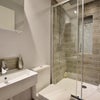 Photo 3: Shared bathroom (cleaned weekly by the landlords complimentary cleaner)