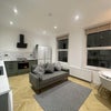 Photo 4: Kitchen/ living area