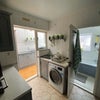 Photo 2: Kitchen and Laundry Room