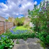 Photo 8: Garden (currently less green due to heatwaves)