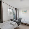 Photo 7: Room 2: Two single beds