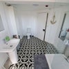 Photo 5: Shared bathroom