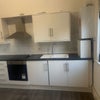 Photo 7: Open plan kitchen snd lounge area