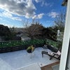 Photo 1: Main terrace with sunset views