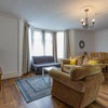 Photo 4: Communal, open-plan living room/dining area/kitchen