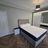 Photo 1: Master Bedroom king size bed